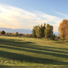 A fall day view of the driving range at Saddleback Golf Club.