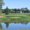 A view over the water of a green at Mariana Butte Golf Course.