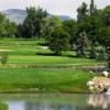 A view over the water of a hole from Olde Course at Loveland.