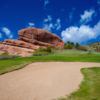 A view of the 16th green guarded by the Whale Rock at Red Rocks Country Club.