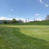 A spring day view of a hole at Broken Tee Englewood Golf Course.