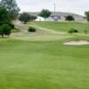 A view of a green guarded by a tricky bunker at Wray Golf Course.