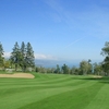 A view of a hole protected by bunkers at Sand Creek Golf Course