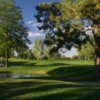 A view of green with water fountain on the left side at 	Fort Collins Country Club