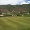 A view of a green protected by a pond at Willow Creek Golf Club from EagleVail.