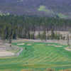 A view of a green flanked by bunkers at Pole Creek Golf Club