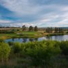 A view of a green with water and bunkers coming into play at Colorado Golf Club