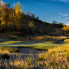 A view of a green protected by bunkers at Eagle Ranch Golf Club
