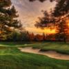 Sunset view of a green at The Country Club at Woodmoor