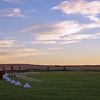 A sunrise view of the driving range at Antler Creek Golf Course