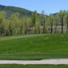 A spring day view of a green at Catamount Ranch and Club.